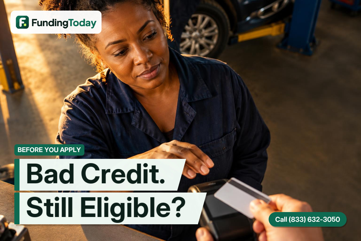 Auto shop owner considering a merchant cash advance with bad credit while serving a customer